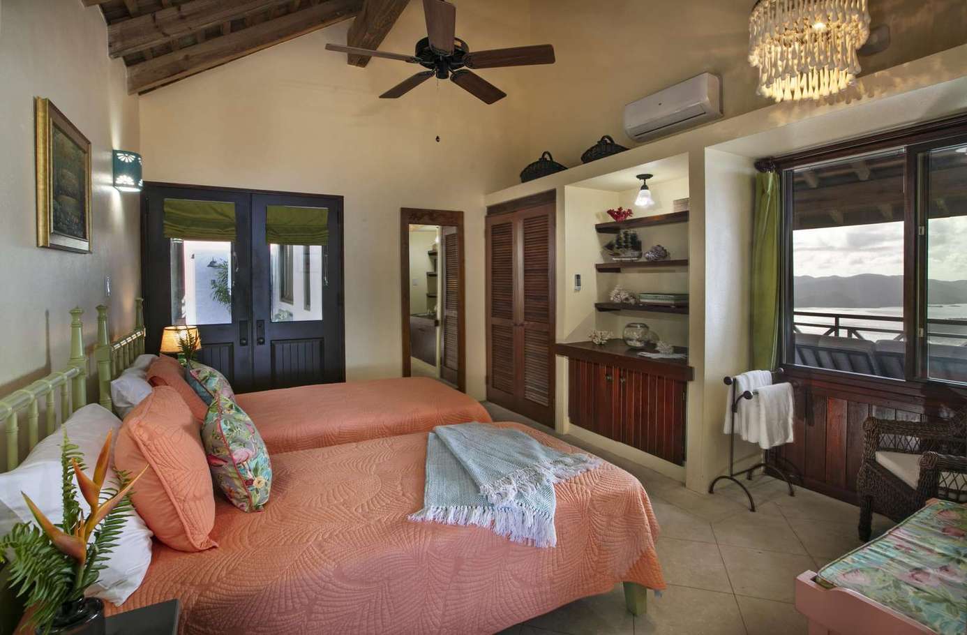 Cozy bedroom retreat with vaulted ceilings and natural light
