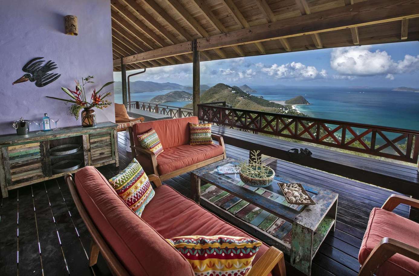 Spacious living room with panoramic ocean views and cozy seating