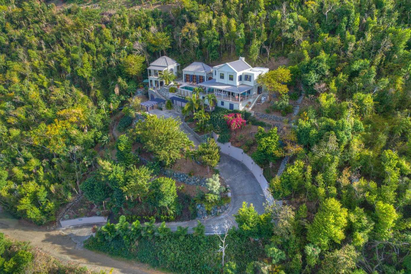 Secluded luxury estate surrounded by lush greenery