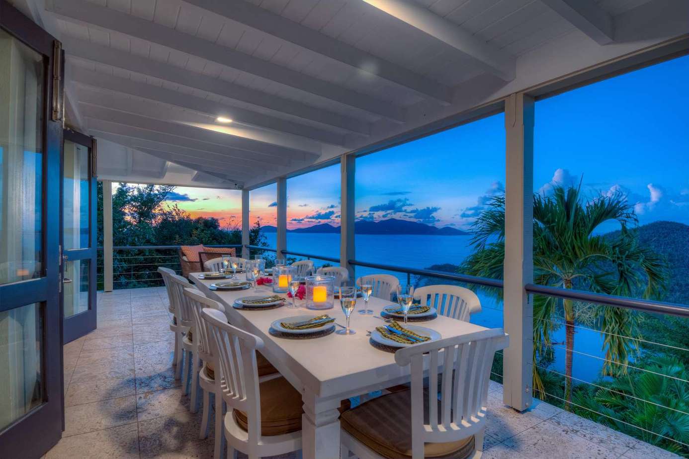 Spacious covered patio with ocean views and sunset dining