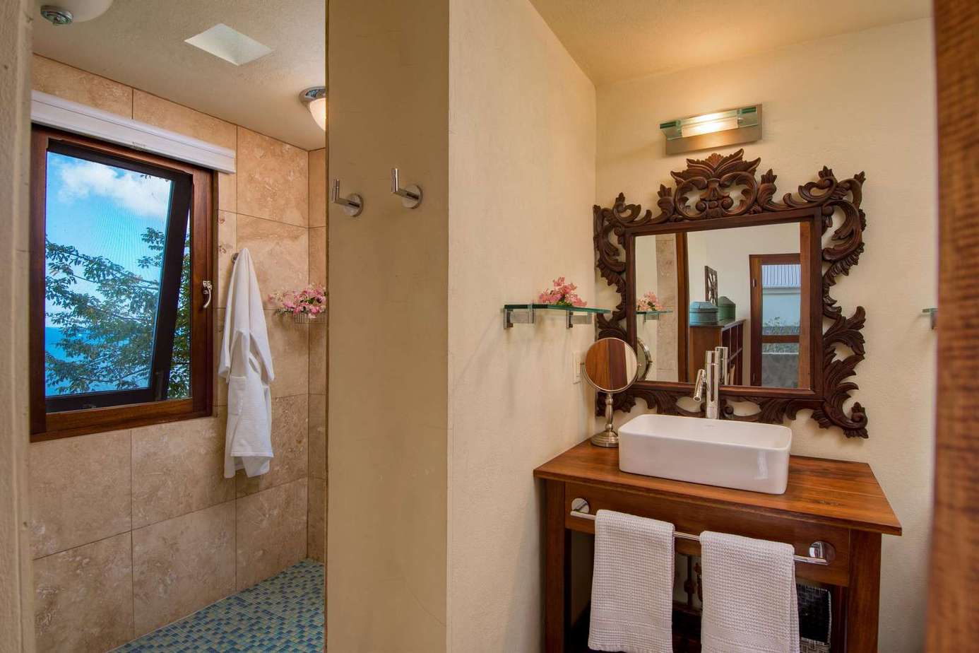 Charming bathroom with rustic wood vanity and natural light