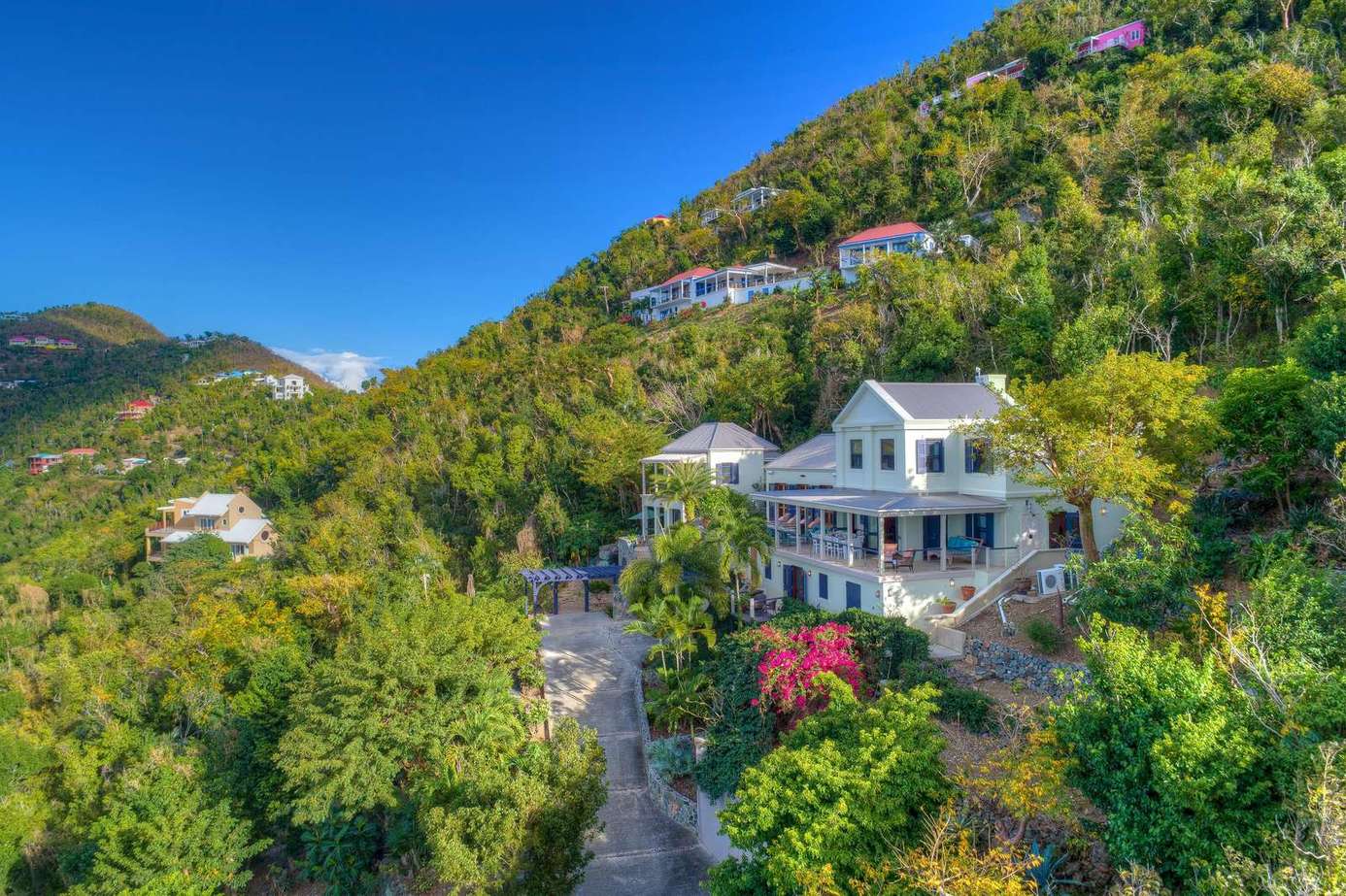 Secluded hillside retreat with panoramic mountain views