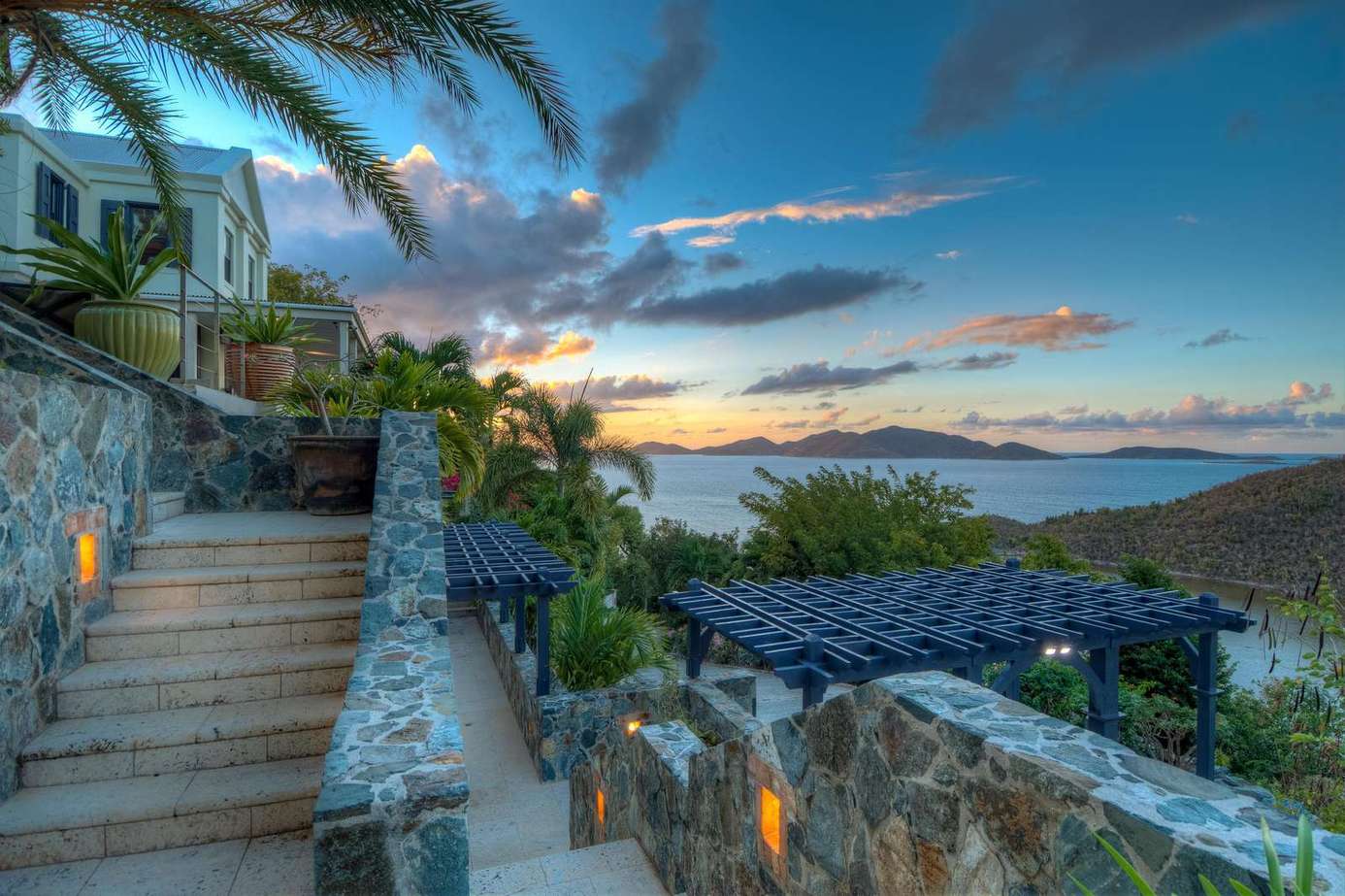 Sunset views from the serene outdoor terrace and garden steps
