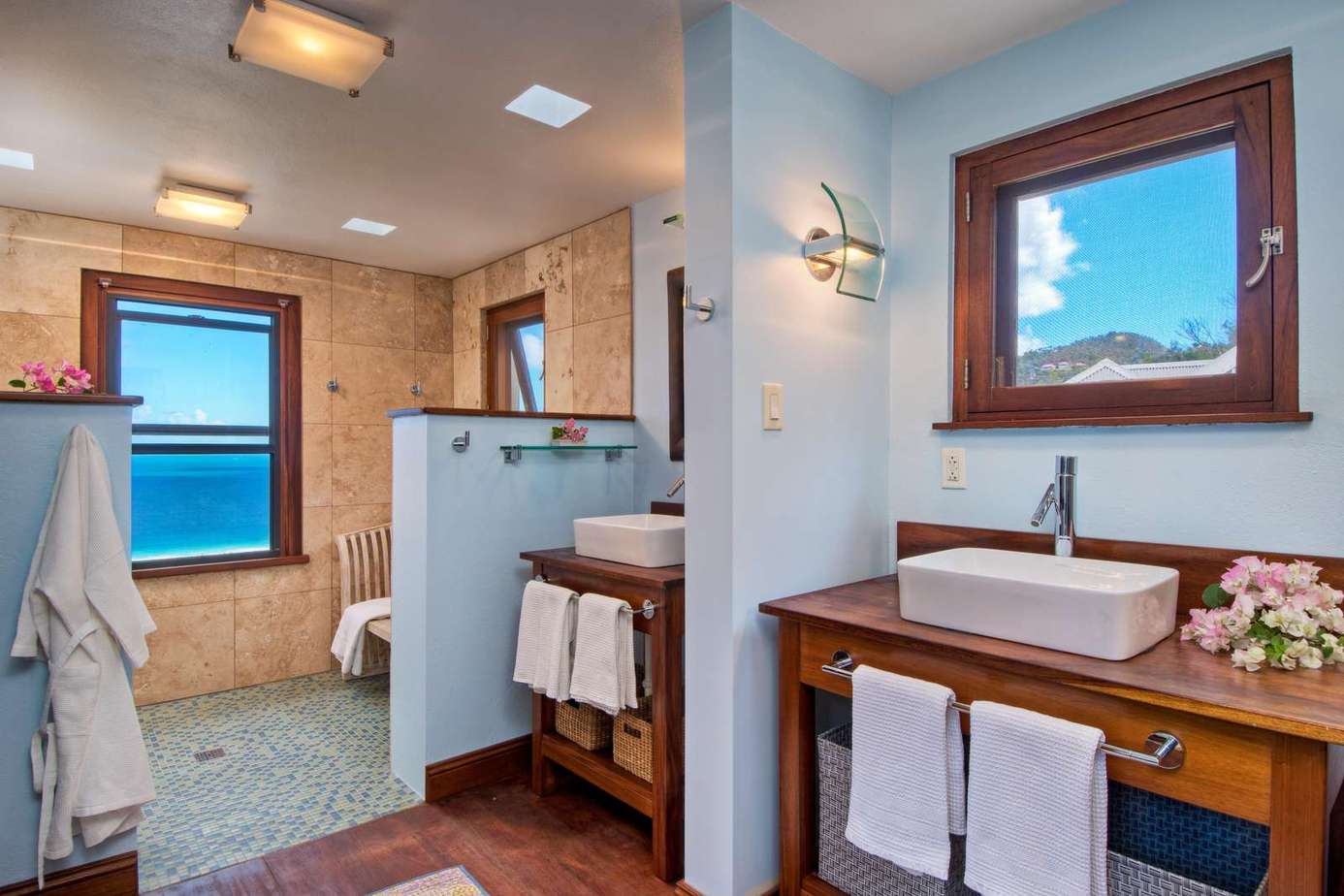 Bright, airy bathroom with ocean views and modern amenities