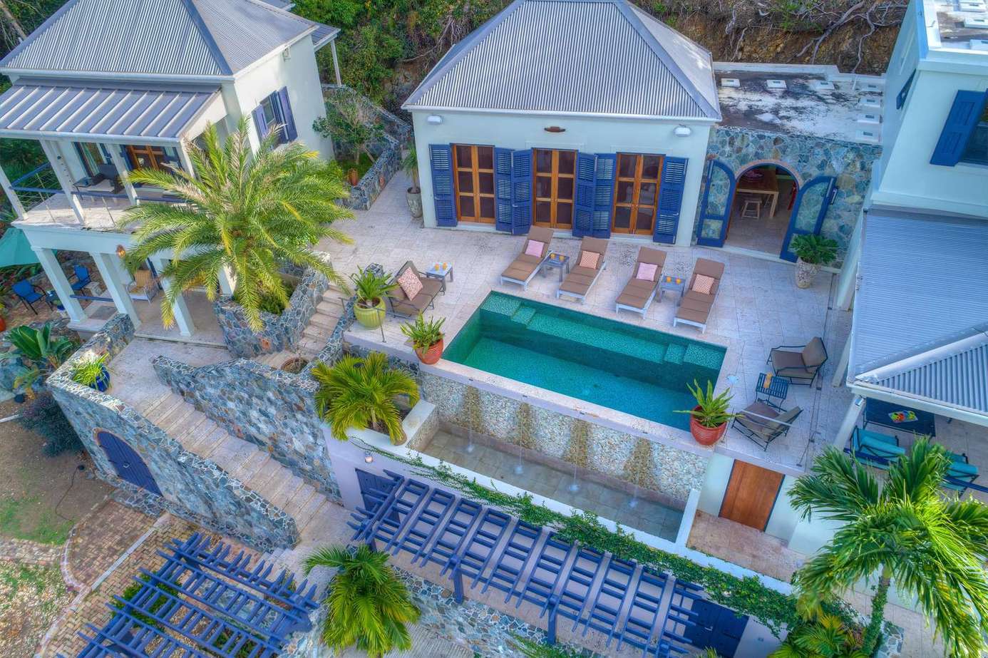 Secluded courtyard with private pool and cozy lounge area
