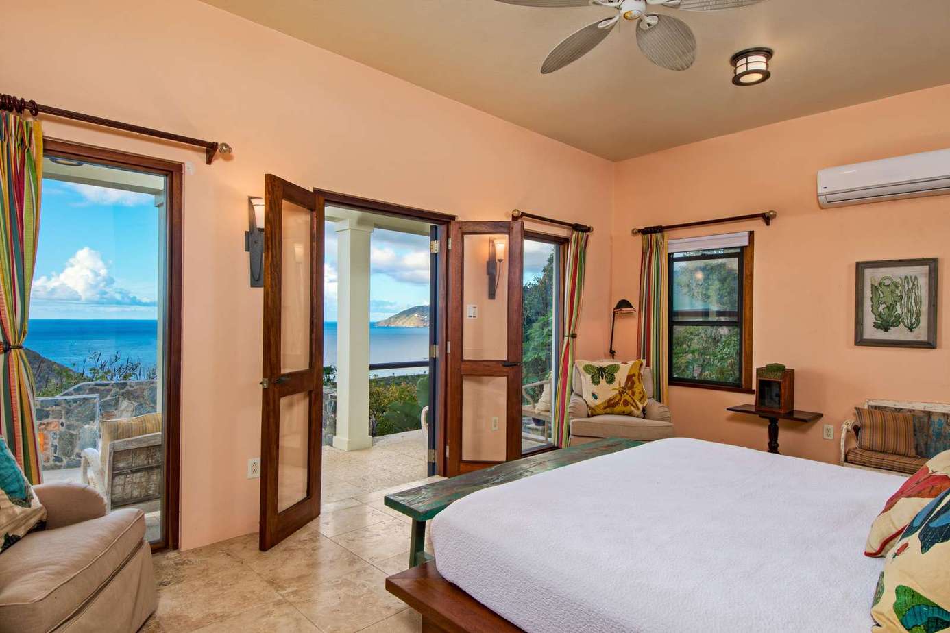 Spacious bedroom with stunning ocean views and natural light