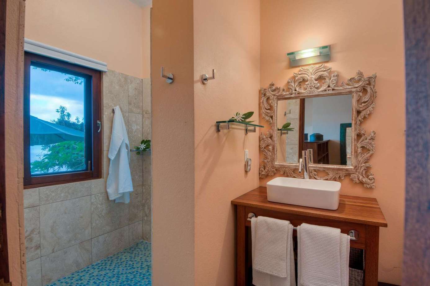 Charming bathroom with rustic wood vanity and natural light