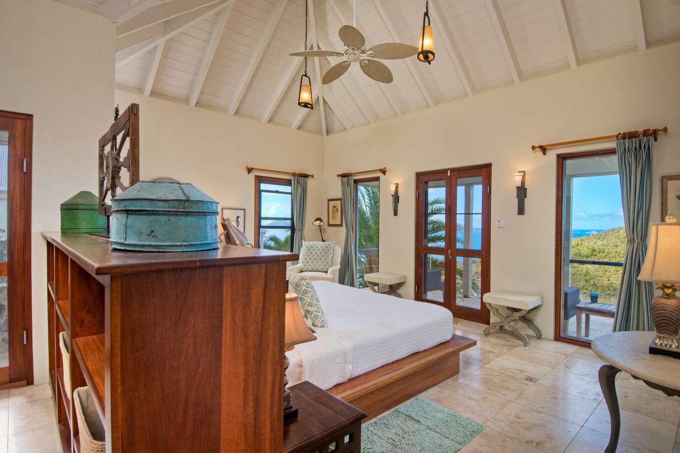 Spacious bedroom with vaulted ceilings and scenic views