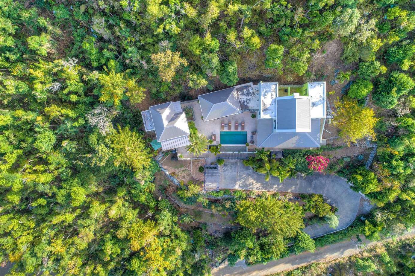Secluded luxury estate with private pool and lush surroundings