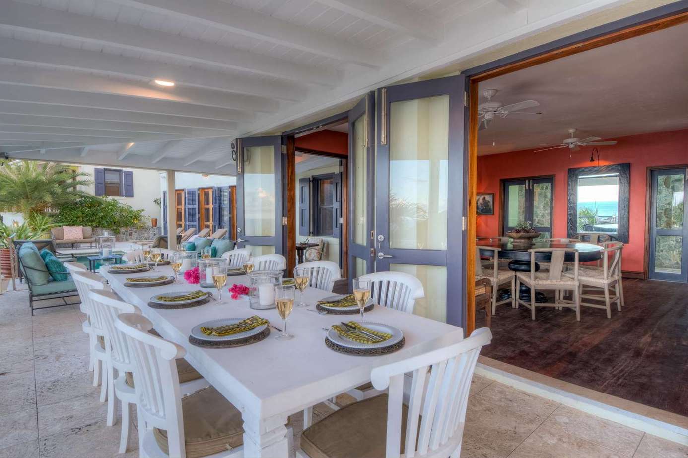 Spacious outdoor dining area with scenic views and cozy seating