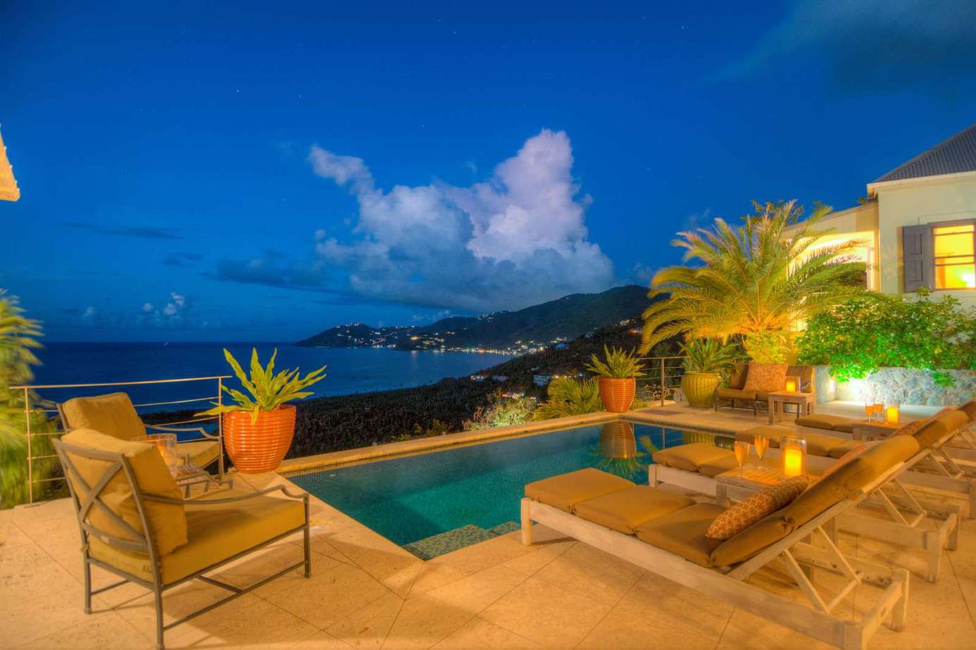 Oceanfront patio with pool and stunning sunset views