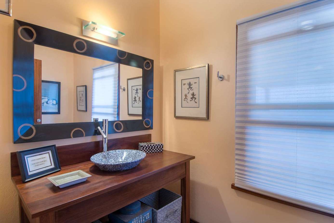 Chic bathroom with modern vessel sink and ambient lighting