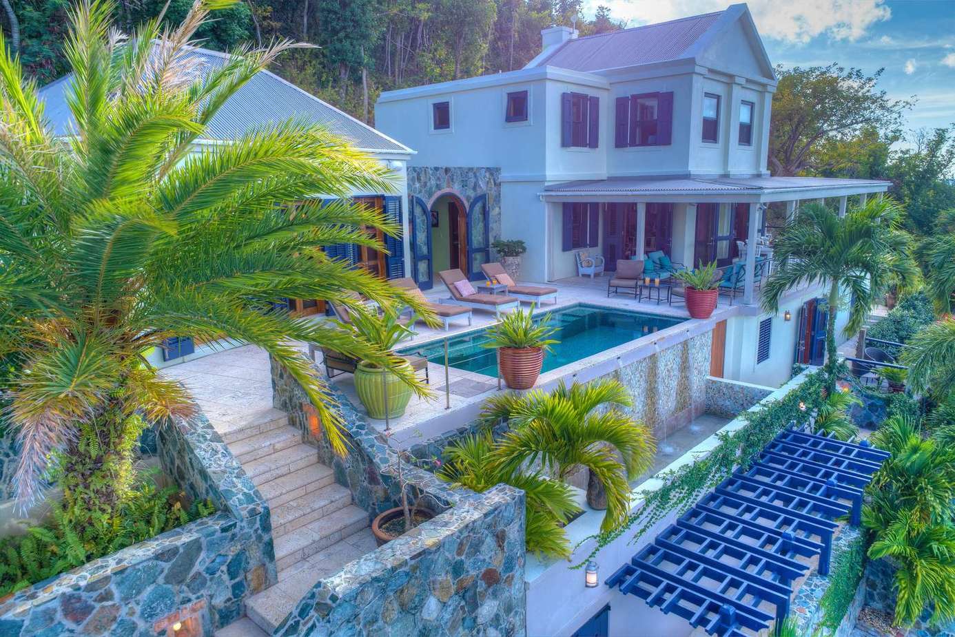 Luxurious outdoor pool area with stunning tropical views