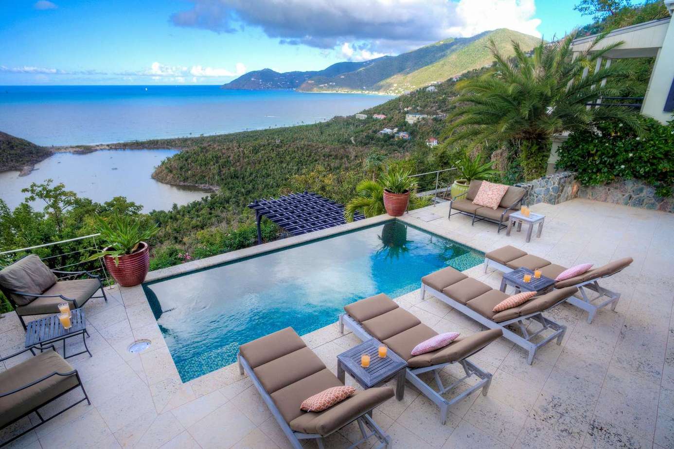 Ocean-view patio with private pool and lounge seating