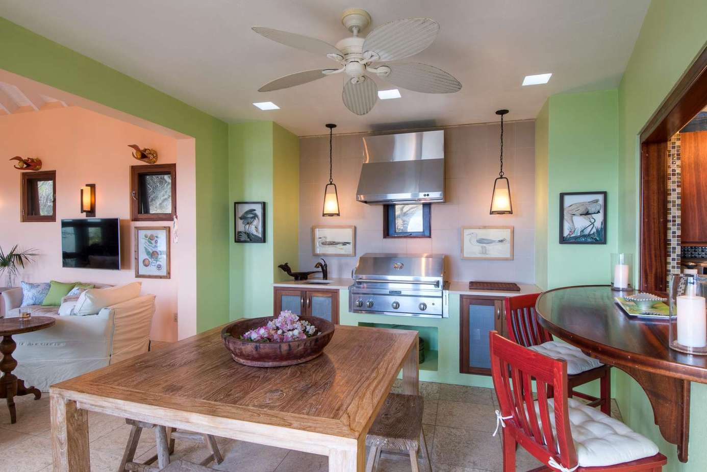 Bright, open kitchen and dining area with vibrant accents