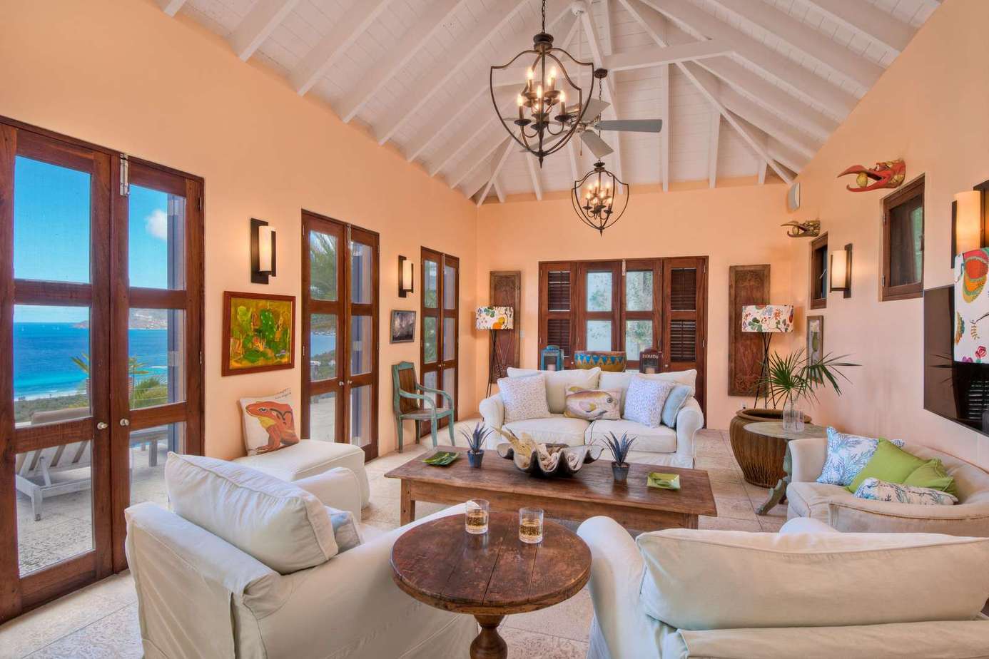 Spacious living room with ocean views and vaulted ceilings