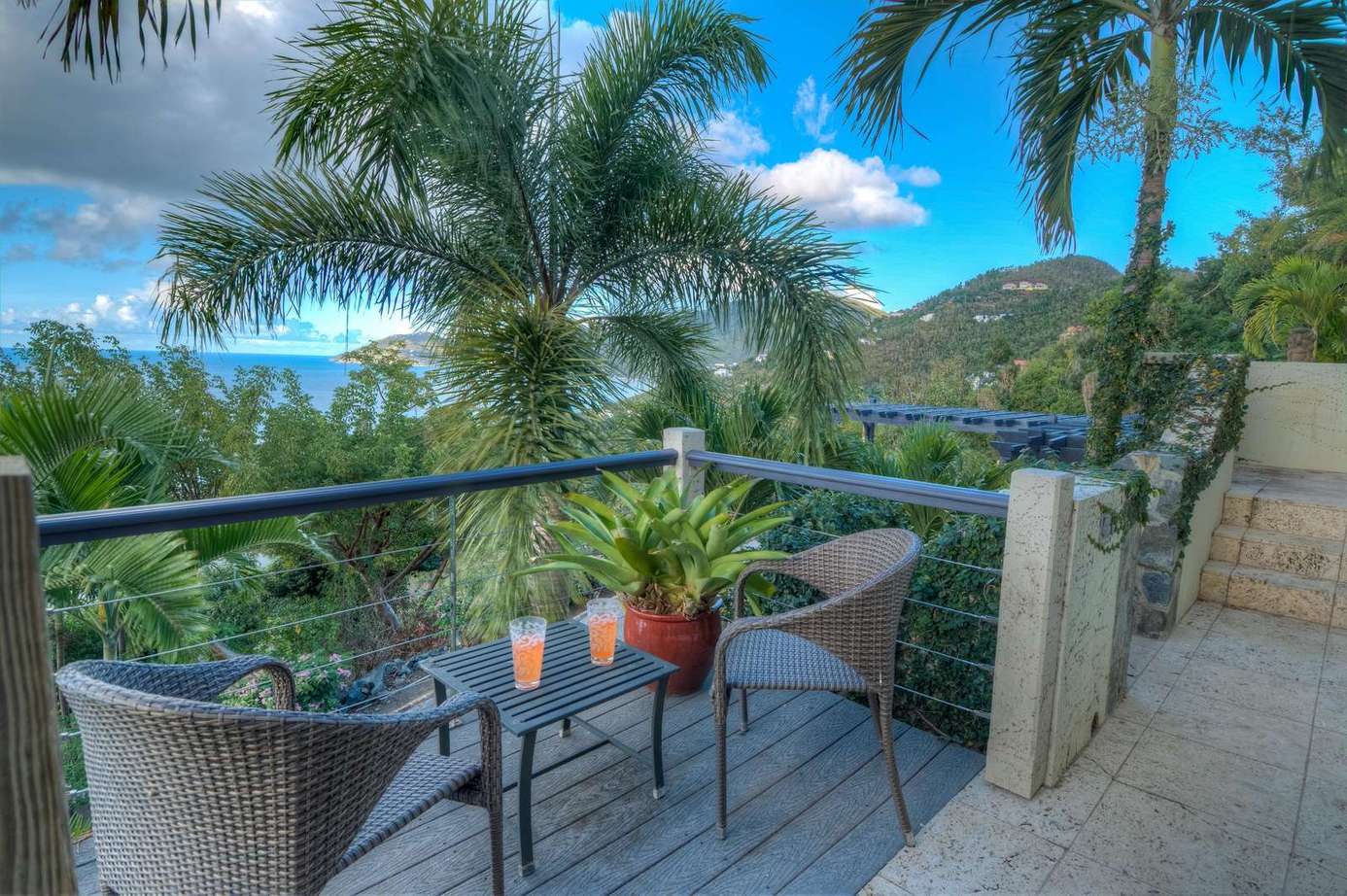 Tranquil balcony retreat with lush mountain views
