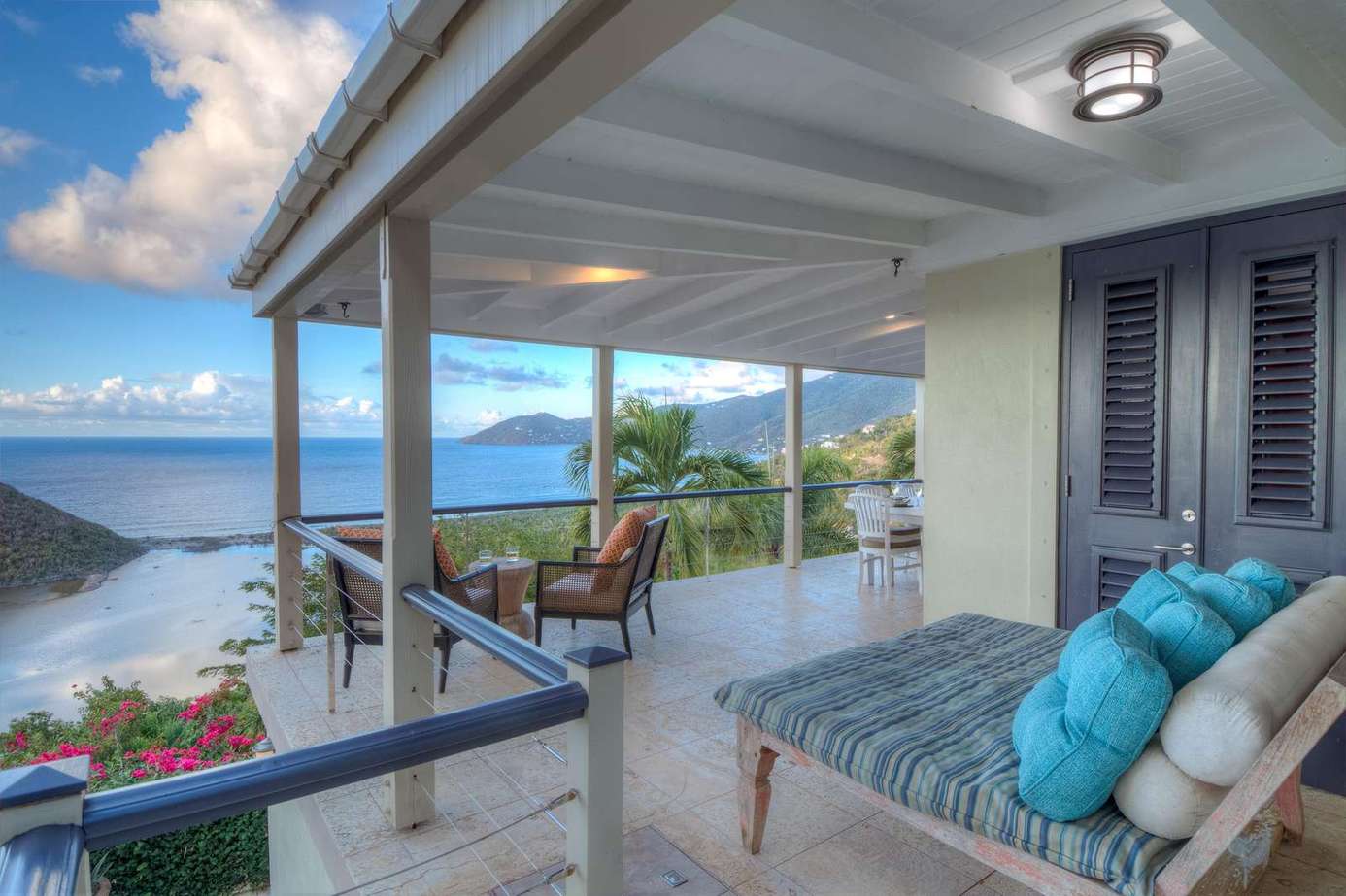 Oceanfront patio with cozy seating and stunning views