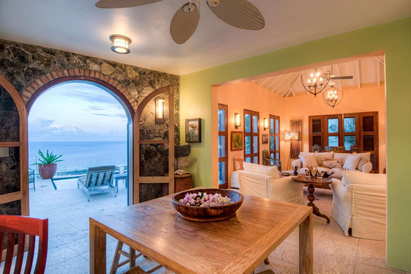 Oceanview dining area with seamless indoor-outdoor flow