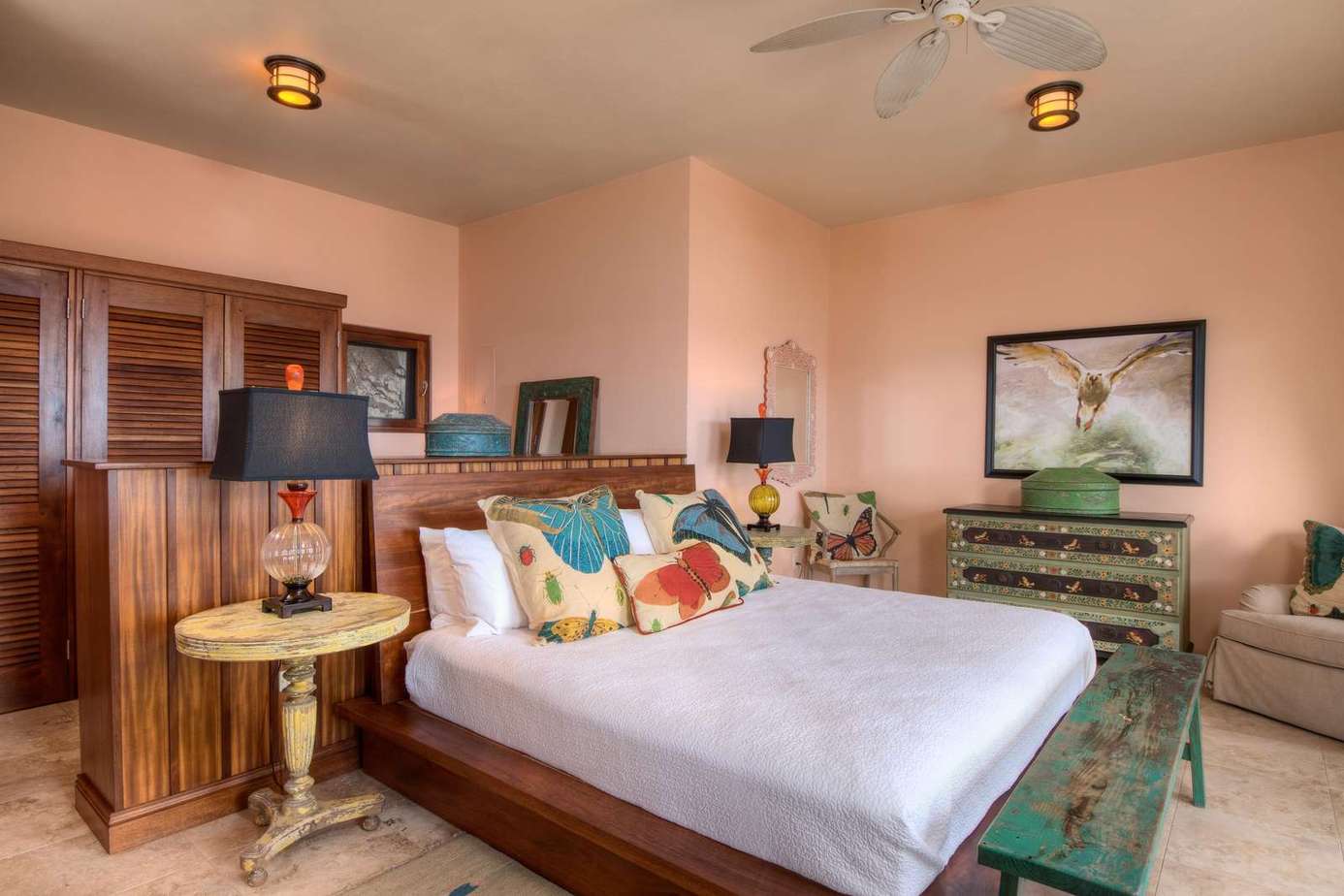 Cozy bedroom retreat with warm lighting and vibrant decor