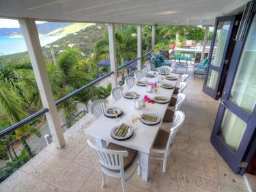Spacious outdoor dining with stunning ocean views on the patio