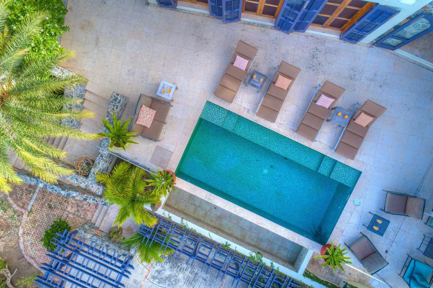 Sun-soaked poolside retreat with ample lounge seating