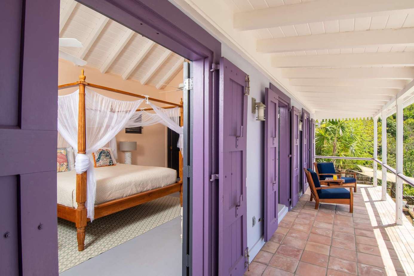 Charming bedroom opens to a sunlit, spacious veranda retreat