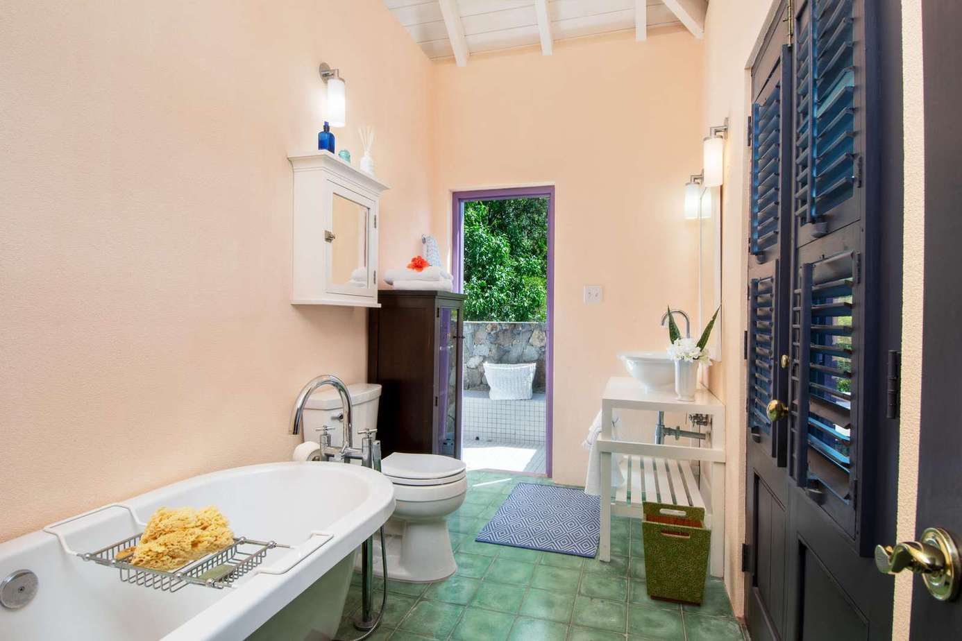 Charming vintage bathroom with garden access and natural light