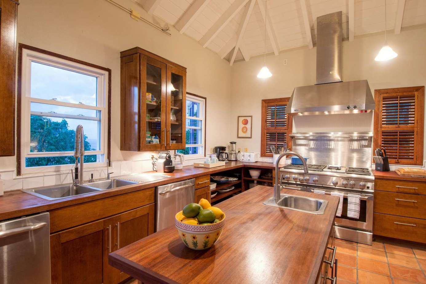 Spacious kitchen with modern appliances and warm wood accents