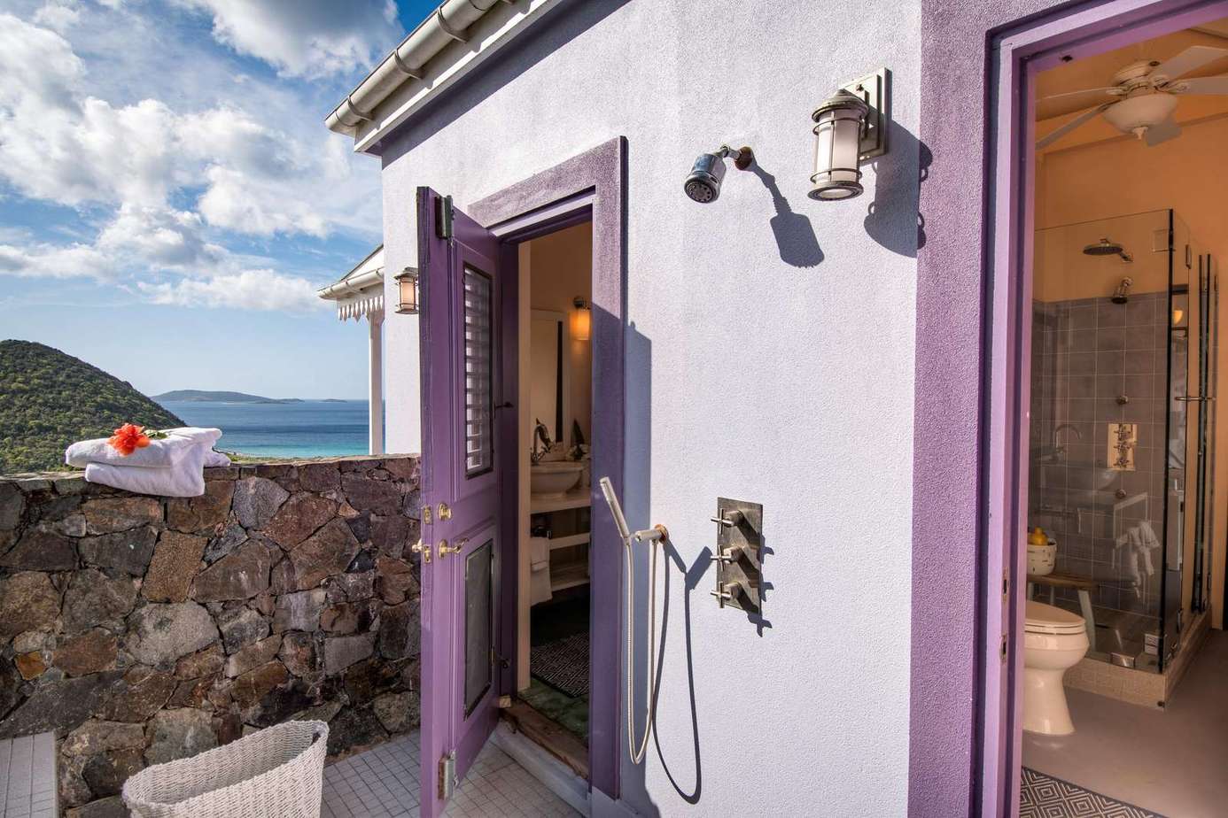 Charming outdoor shower with scenic mountain views