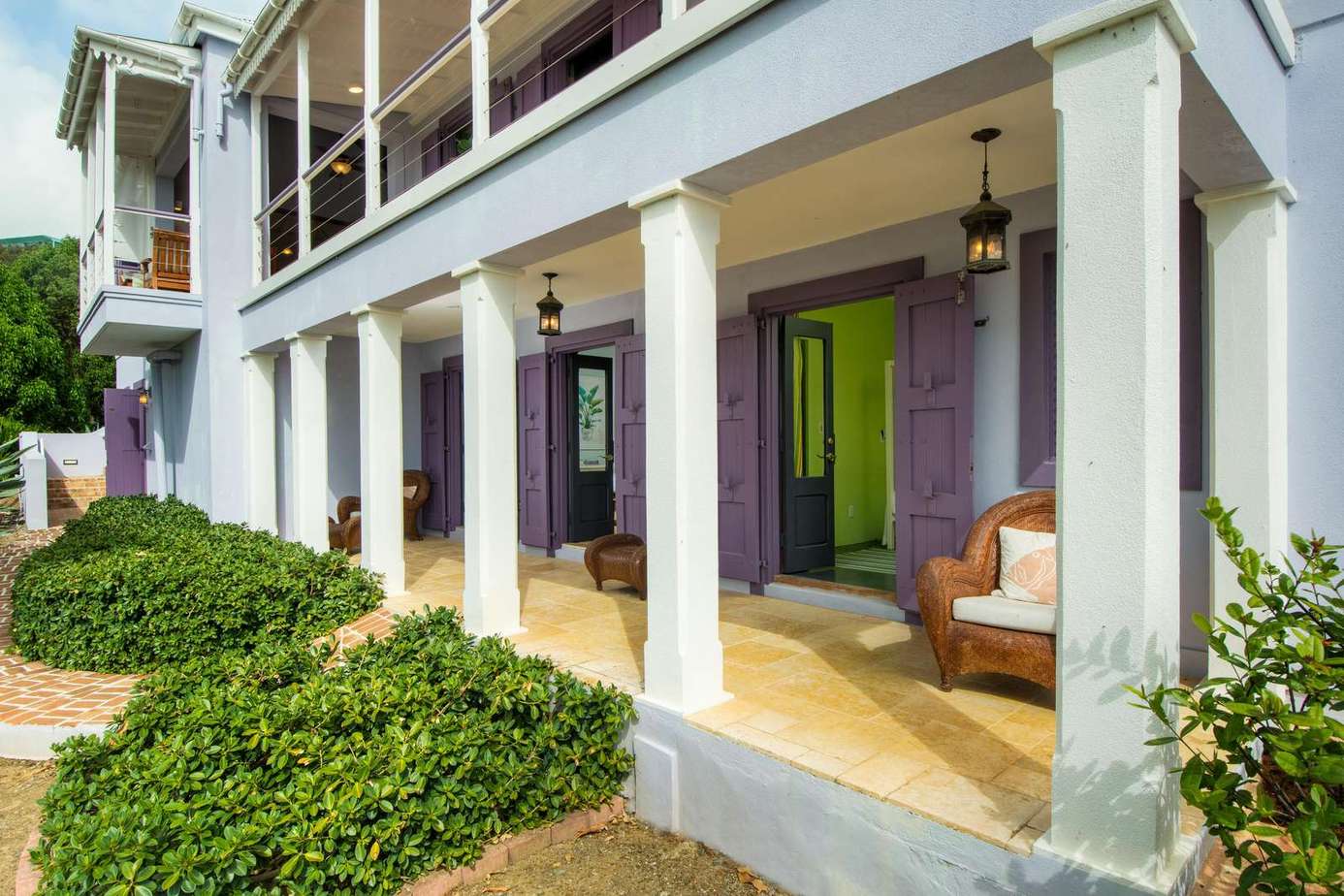 Charming covered porch with cozy seating for relaxing outdoors