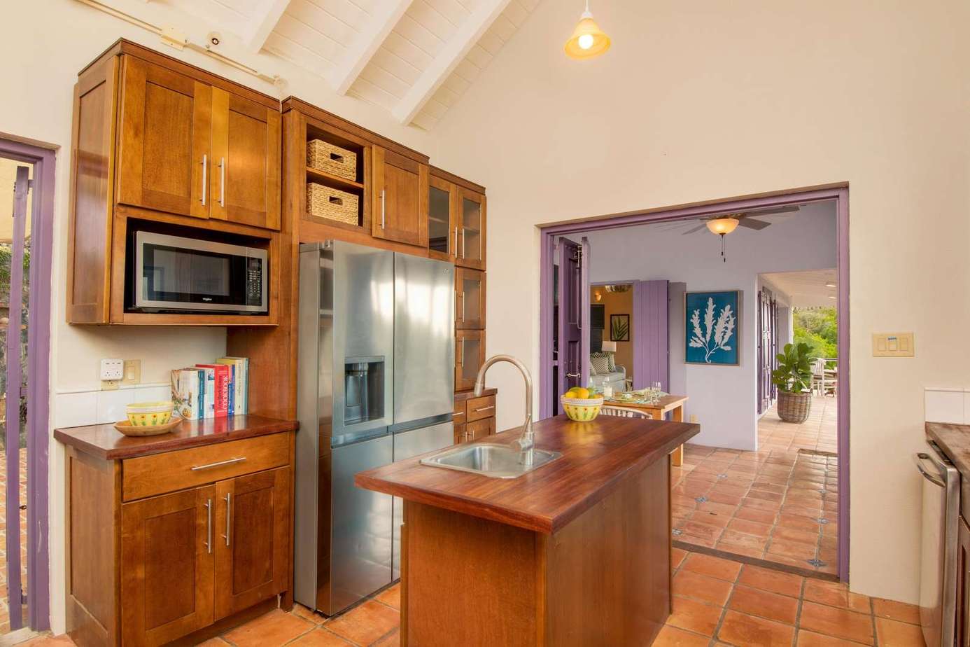 Modern kitchen with stainless steel appliances and warm wood accents