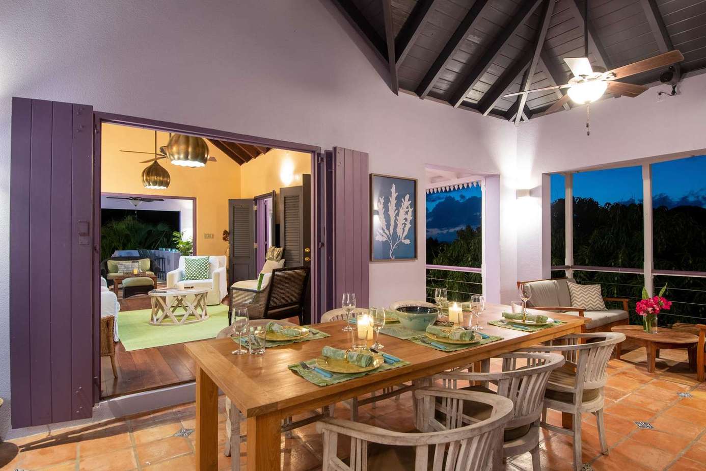 Spacious open-air dining area with stunning evening views