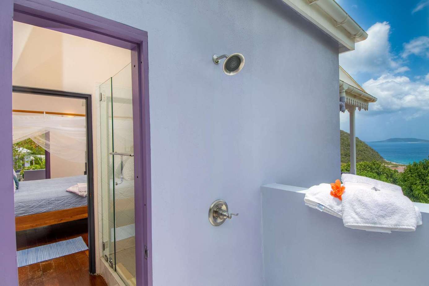 Private balcony with ocean views and fresh towels ready