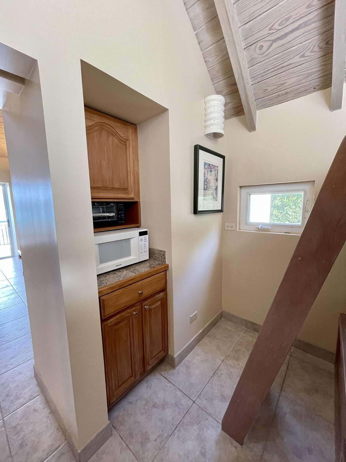 Cozy bathroom nook with vaulted ceiling and warm wood accents