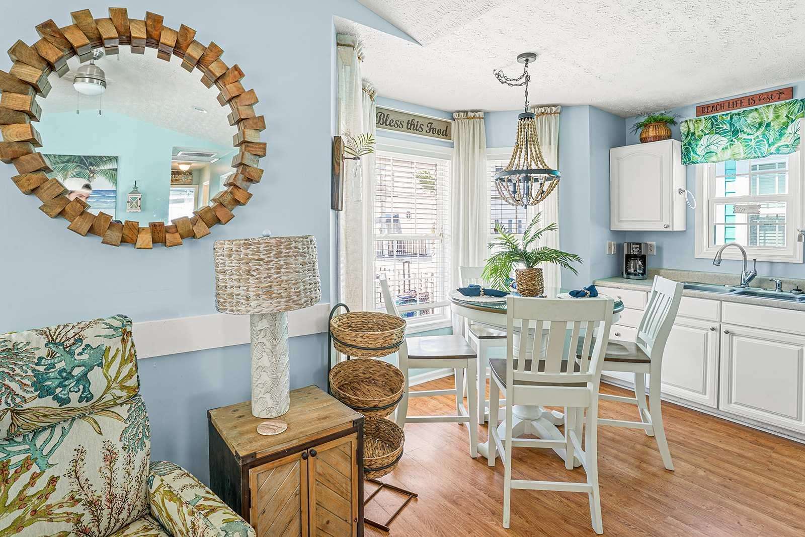 Bright and airy kitchen dining area with coastal charm - property